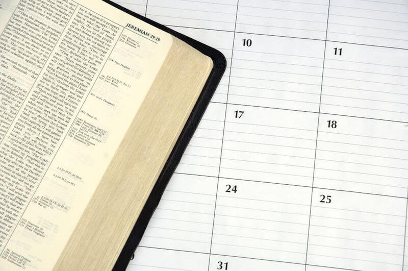 Daily devotions showing Bible and a calendar