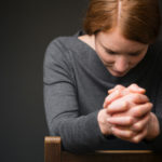 Righteous person's prayer has great power image showing a praying woman