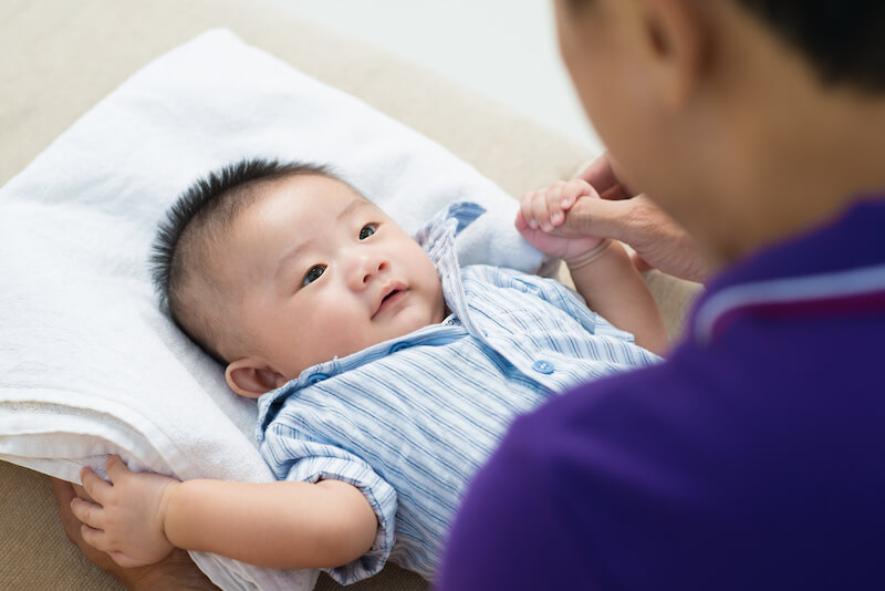 new birth showing an asian baby