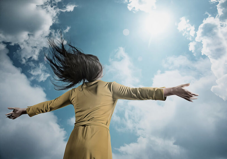 ministering to the Lord showing a woman with hands lifted up