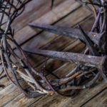 he was wounded for our transgressions showing crown of thorns and nails