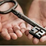 Unto You it is Given to Know the Mystery of the Kingdom of God showing a key in a person's hands