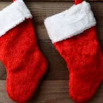 two parts of Christmas showing two red socks