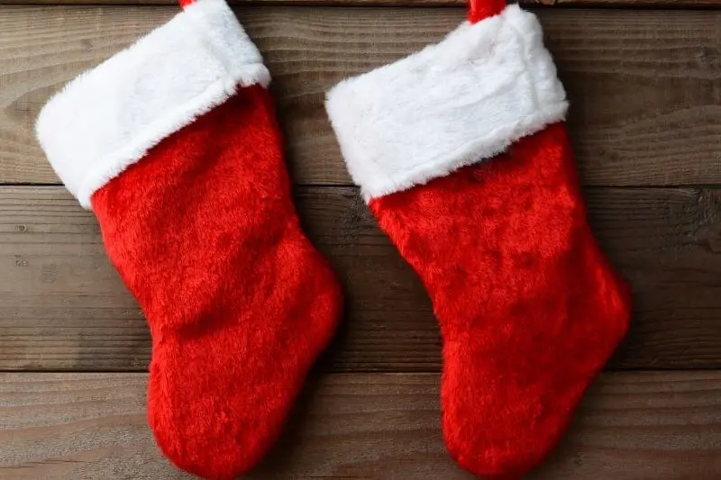 two parts of Christmas showing two red socks