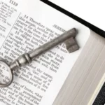 Christ our wisdom showing a key on the Bible