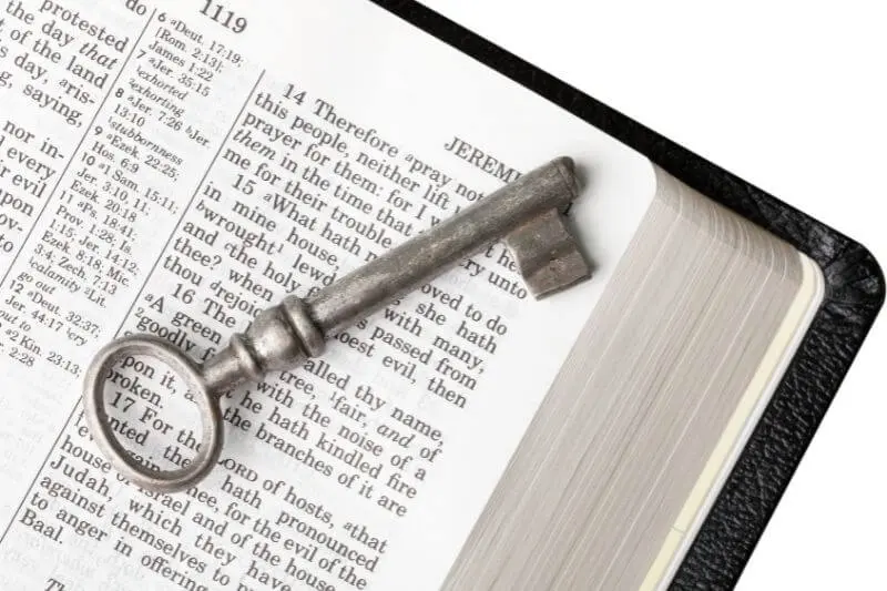 Christ our wisdom showing a key on the Bible