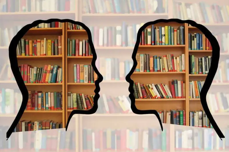the knowledge of God is qualitative and quantitative showing two human heads made of books