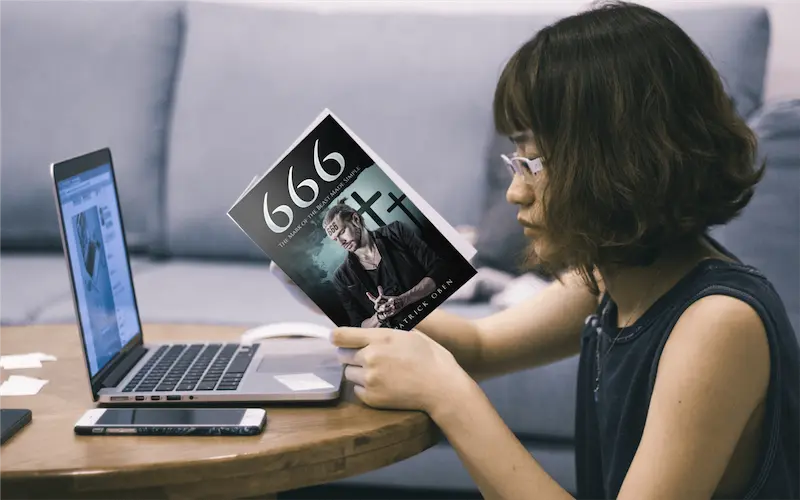 Asian girl reading the book on 666